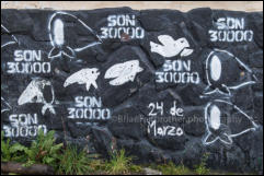 Ushuaia, Argentina. White head scarf symbol painted on a wall. The symbol was used by the Mothers of the Plaza de Mayo movement to symbolize the diapers (nappies) of their lost children who ‘"disappeared" during the military dictatorship